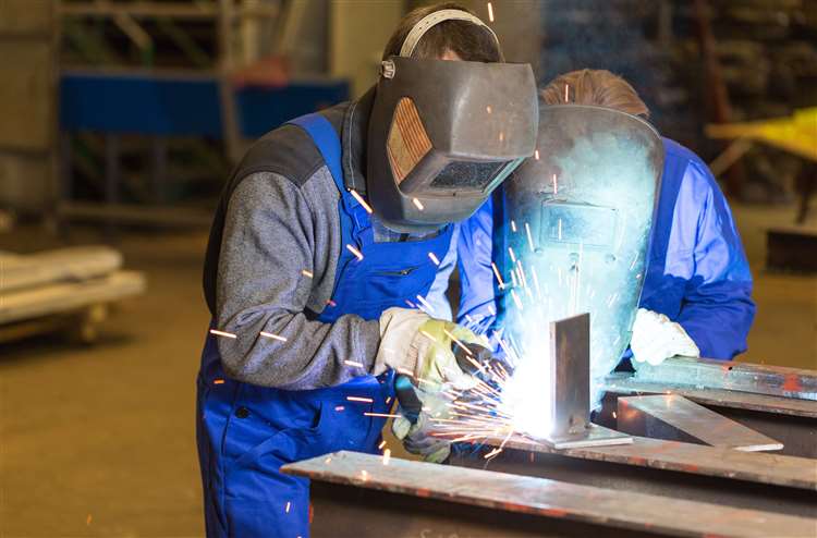 A person welding