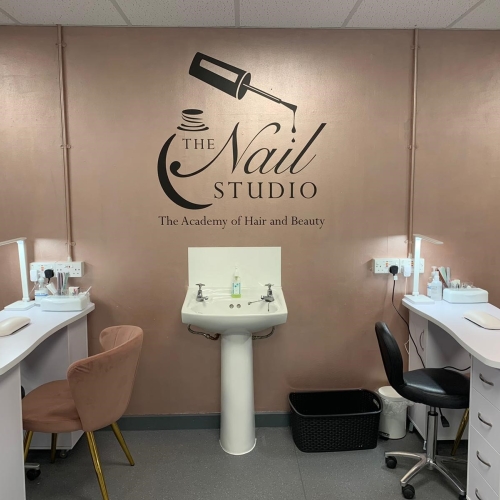 Photo of nail studio logo on wall